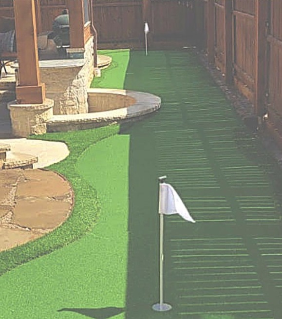 Turf putting green and playset borders